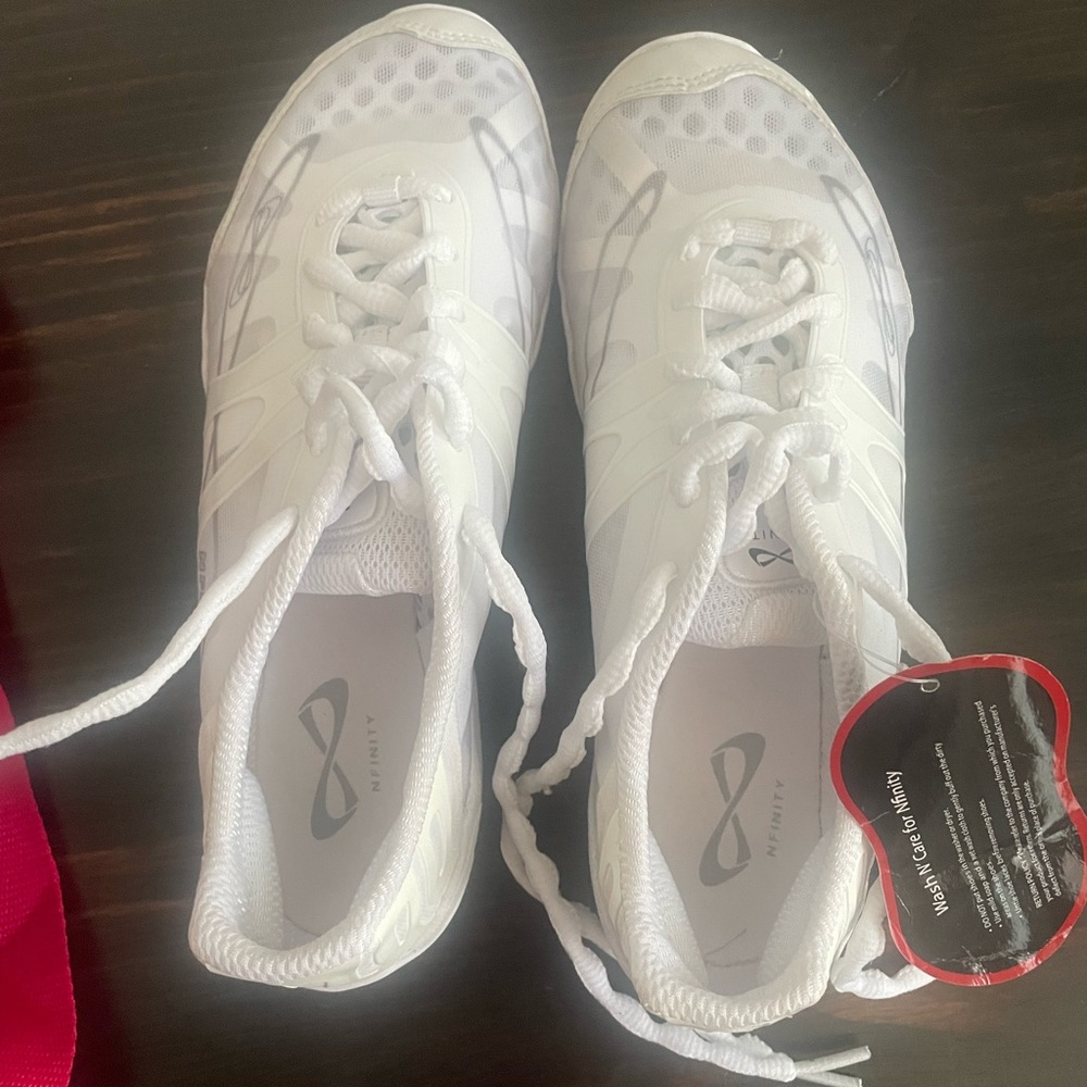 Brand new nfinity vengeance cheer shoes size 6.5 women. Tags still on